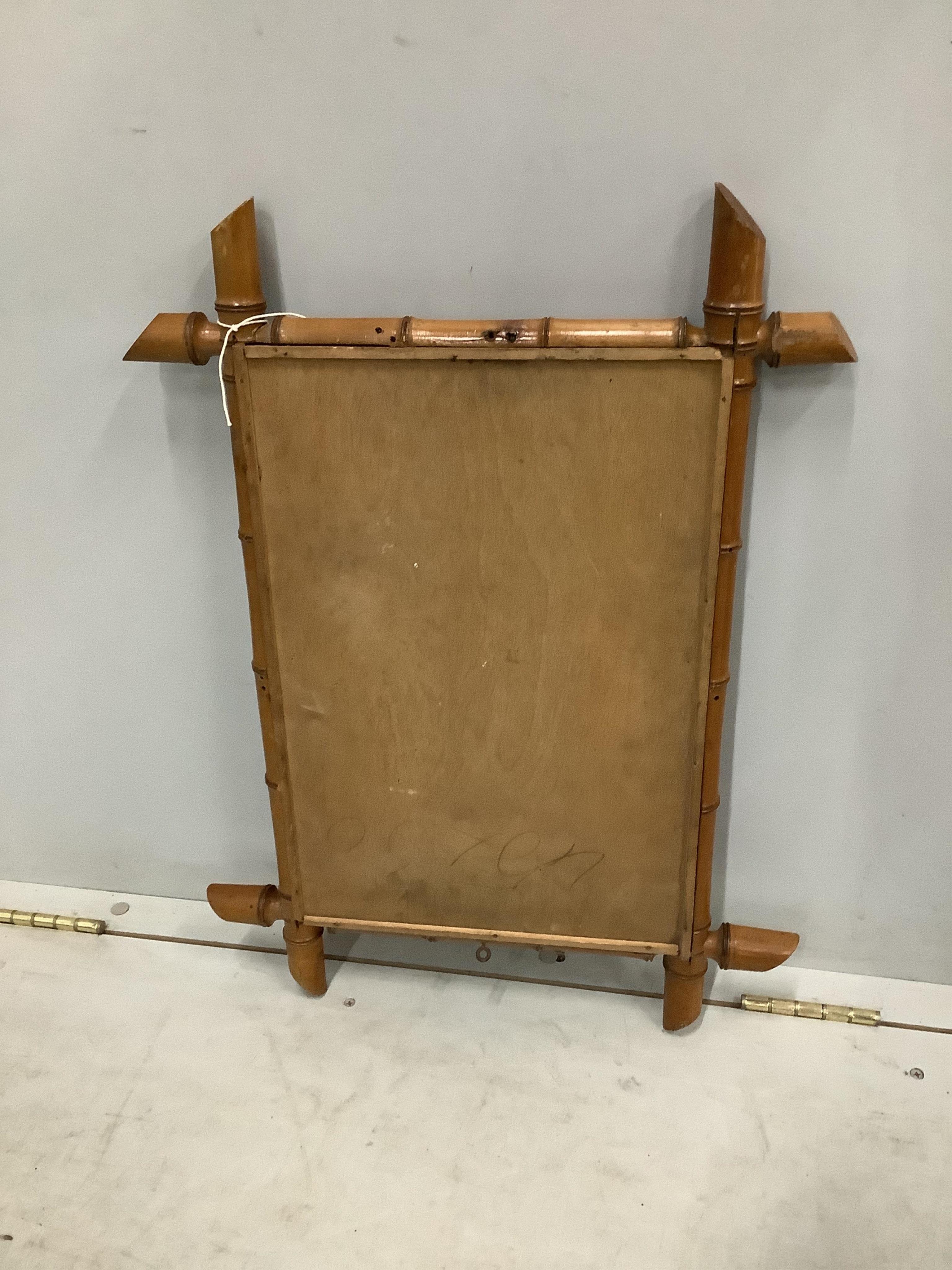 Two late 19th century French rectangular simulated bamboo wall mirrors, larger width 45cm, height 63cm. Condition - fair